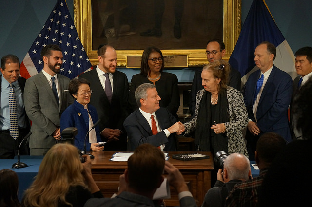 brewer de blasio bill signing